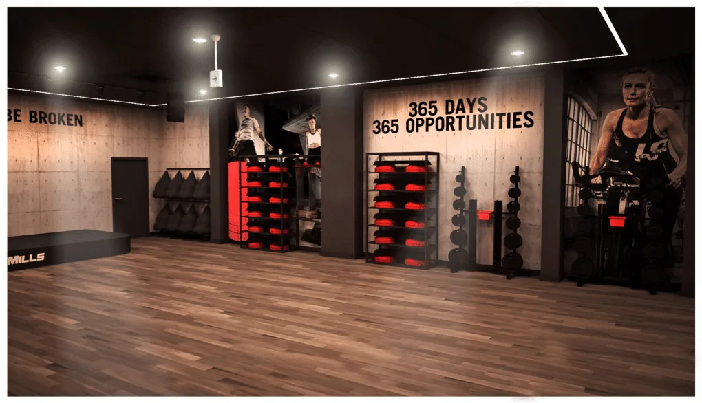 Les Mills Japan training studio interior with timber flooring, red equipment storage and angular ceiling lighting