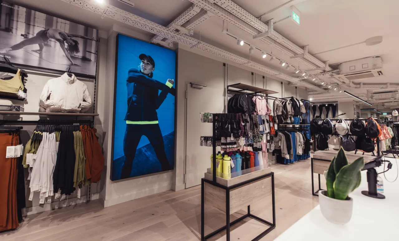 Product displays, timber fixtures and planting in a lululemon store